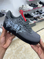 Nike Air Force 1 black white graffiti-style graphic splatter design
