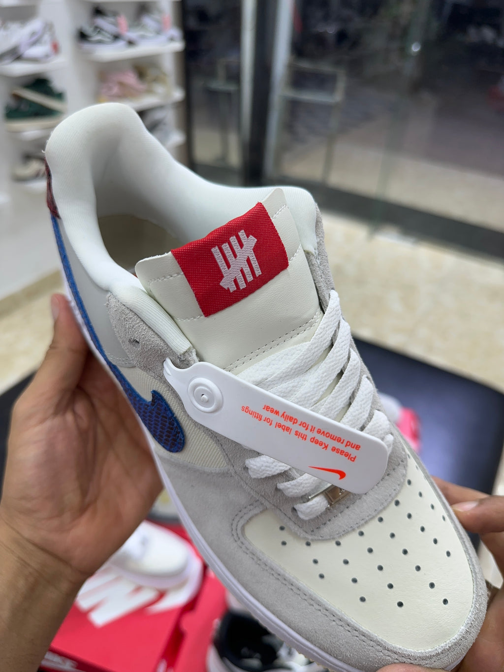 Nike Air Force 1 low “Undefeated” Blue Swoosh