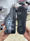 Nike Air Force 1 black white graffiti-style graphic splatter design