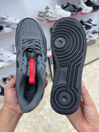 Nike Air Force 1 black white graffiti-style graphic splatter design