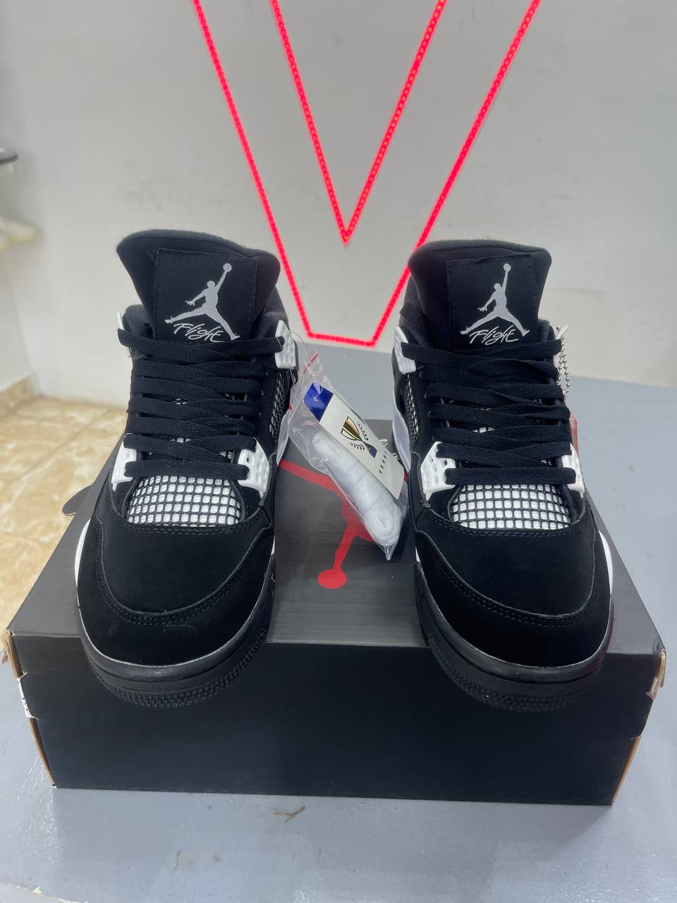 Jordan 4 “White Thunder"